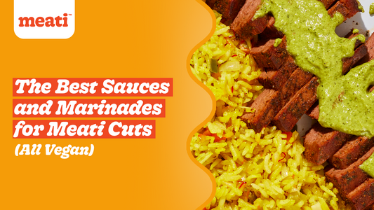 Meati cutlets topped with a green sauce on a bed of rice 